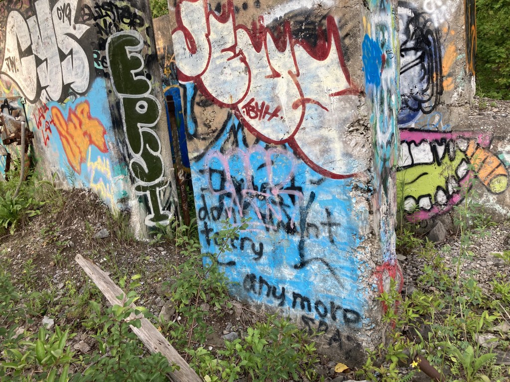 A photo of graffiti with the words "I don't want to cry anymore"