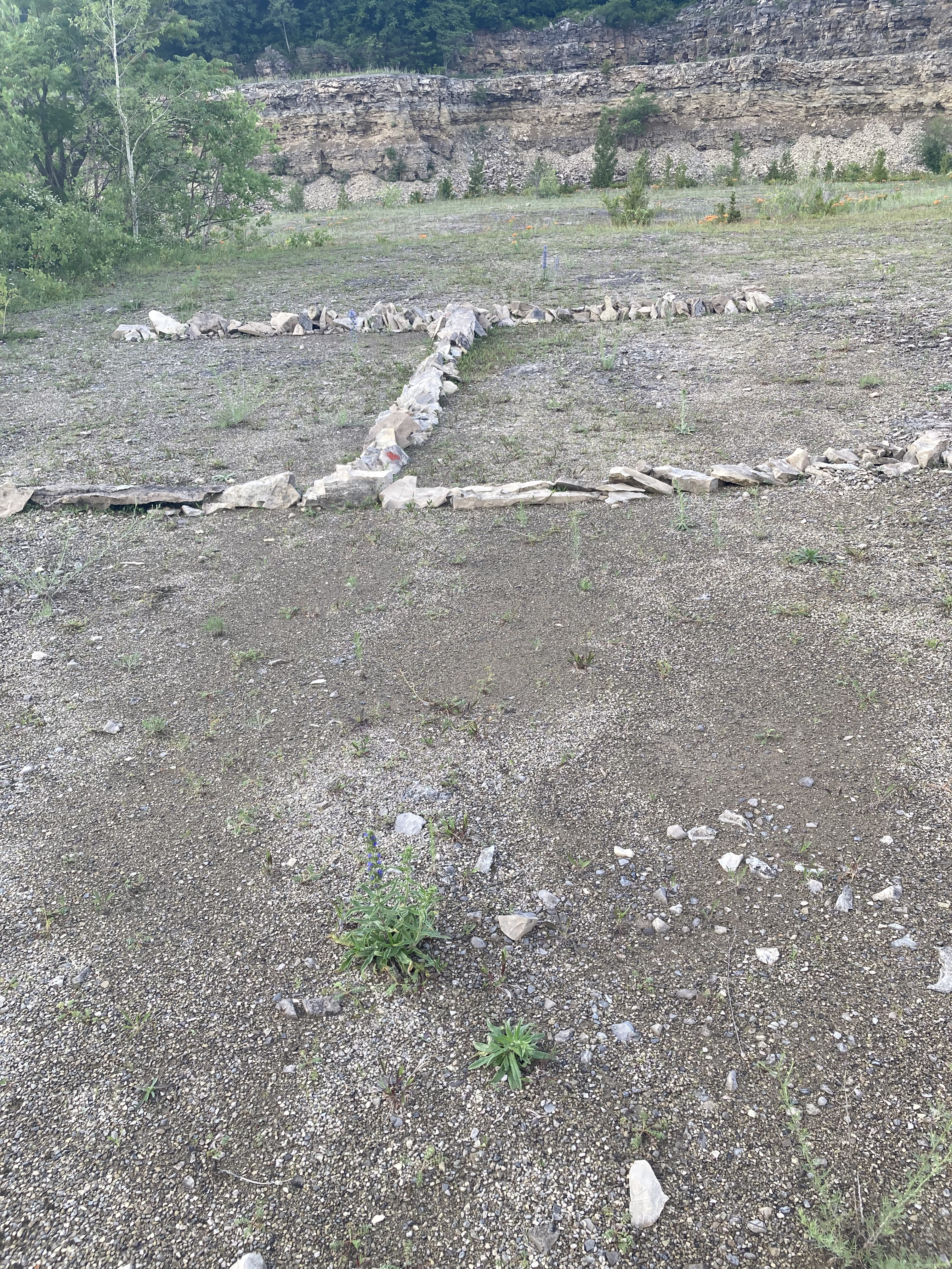 The letter "I" made out of stones