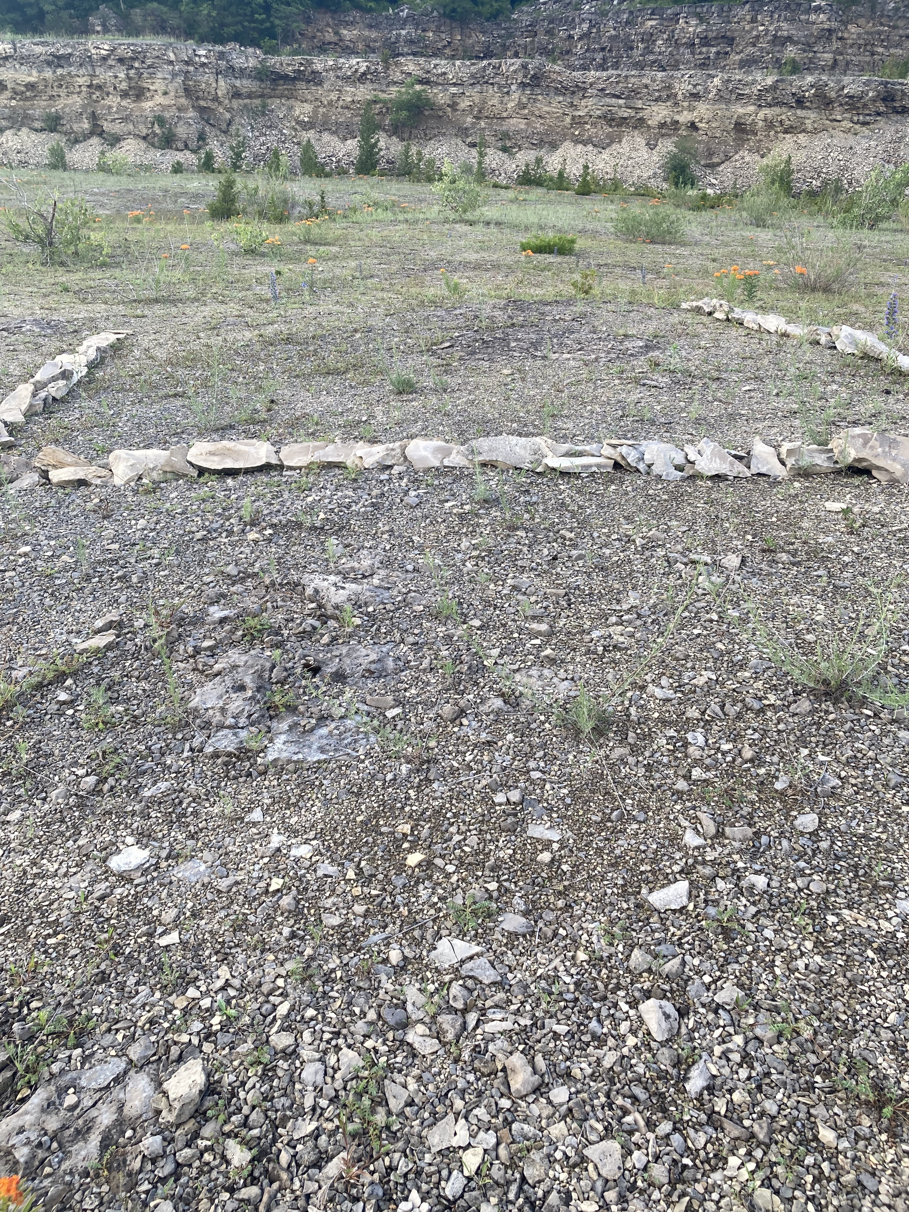 The letter "U" made out of stones